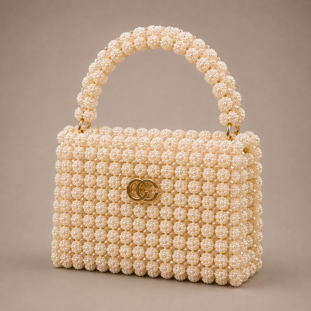 Ceylan Ivory Pearl Clasp bag, angled view