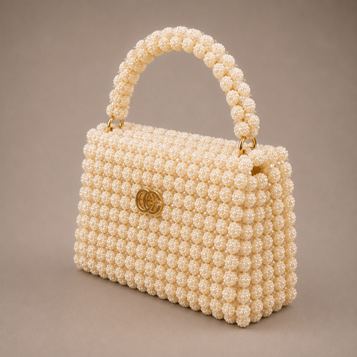 Ceylan Ivory Pearl Clasp bag, three-quarter view